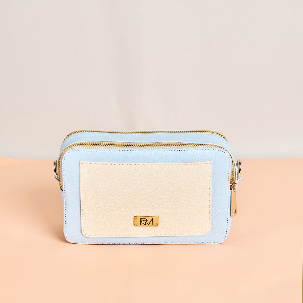 
                  
                    Cartera Celeste
                  
                